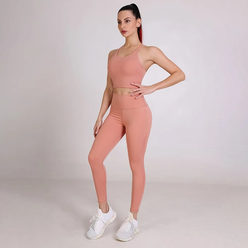 Rosa træningssæt med crop top og leggings