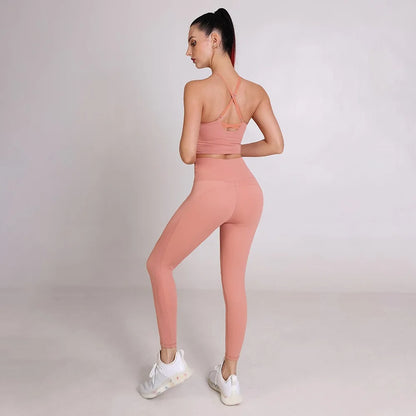 Rosa træningssæt med crop top og leggings